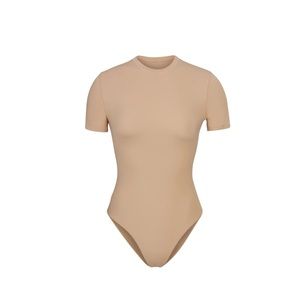 BRAND NEW Skims thing bodysuit. Never worn